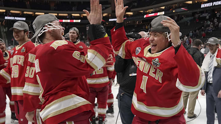 Apr 13, 2024; Saint Paul, Minnesota, USA; Denver Pioneers defenseman Boston Buckberger (9) and defenseman Lucas Olvestad (11) celebrate after defeating the Boston College Eagles for the national championship at the 2024 Frozen Four college ice hockey tournament at Xcel Energy Center. Mandatory Credit: Nick Wosika-Imagn Images Apr 13, 2024; Saint Paul, Minnesota, USA; Denver Pioneers defenseman Boston Buckberger (9) and defenseman Lucas Olvestad (11) celebrate after defeating the Boston College Eagles for the national championship at the 2024 Frozen Four college ice hockey tournament at Xcel Energy Center. Mandatory Credit: Nick Wosika-Imagn Images