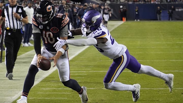 Caleb Williams reaches for the goal line on a scramble in the fourth quarter.