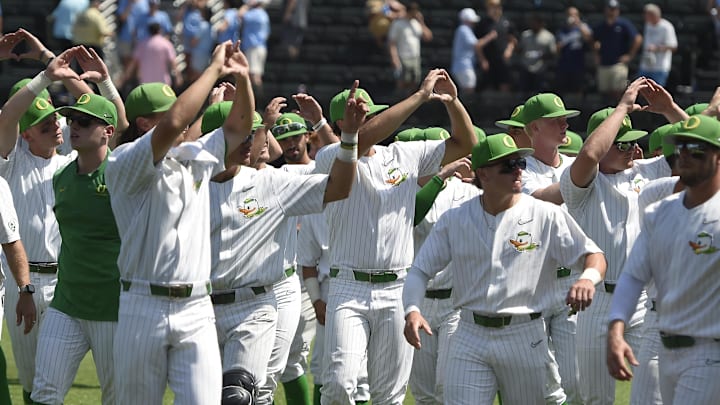 Jun 2, 2023; Nashville, TN, USA;  Oregon Ducks celebrate the win with the fans in the stadium.