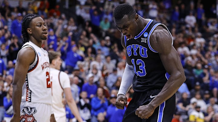 Mar 22, 2025; Denver, CO, USA; Brigham Young Cougars center Keba Keita (13) reacts against the Wisconsin Badgers during the second half in the second round of the NCAA Tournament  at Ball Arena. Mandatory Credit: Isaiah J. Downing-Imagn Images