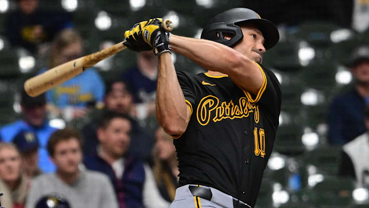 Pittsburgh Pirates right fielder Bryan Reynolds (10) hits a solo home run in the ninth inning against the Milwaukee Brewers at American Family Field.