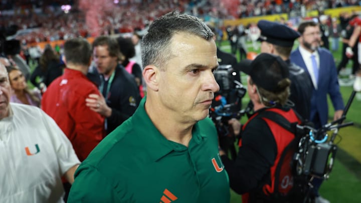 Jan 19, 2026; Miami Gardens, FL, USA; Miami Hurricanes head coach Mario Cristobal reacts after the College Football Playoff National Championship game at Hard Rock Stadium. Mandatory Credit: Mark J. Rebilas-Imagn Images Jan 19, 2026; Miami Gardens, FL, USA; Miami Hurricanes head coach Mario Cristobal reacts after the College Football Playoff National Championship game at Hard Rock Stadium. Mandatory Credit: Mark J. Rebilas-Imagn Images