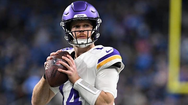 Jan 5, 2025; Detroit, Michigan, USA; Minnesota Vikings quarterback Sam Darnold (14) throws passes during pregame warmups before their game against the Detroit Lions at Ford Field. Jan 5, 2025; Detroit, Michigan, USA; Minnesota Vikings quarterback Sam Darnold (14) throws passes during pregame warmups before their game against the Detroit Lions at Ford Field.