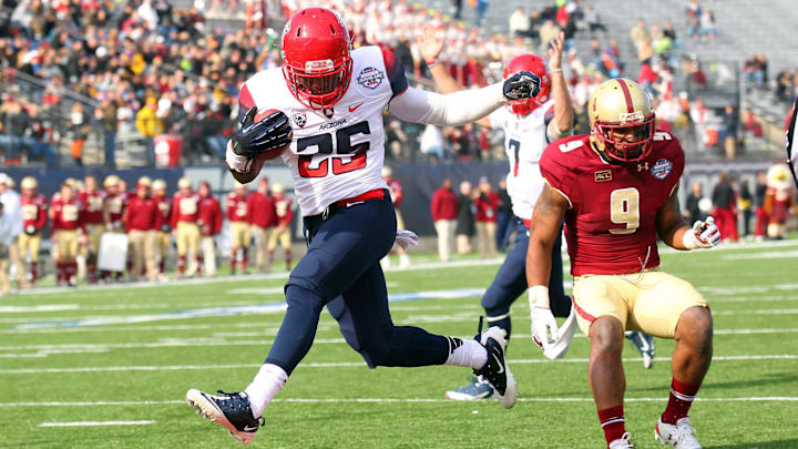 Dec 31, 2013; Shreveport, LA, USA; Arizona Wildcats running back Ka'Deem Carey (25) carries the ball