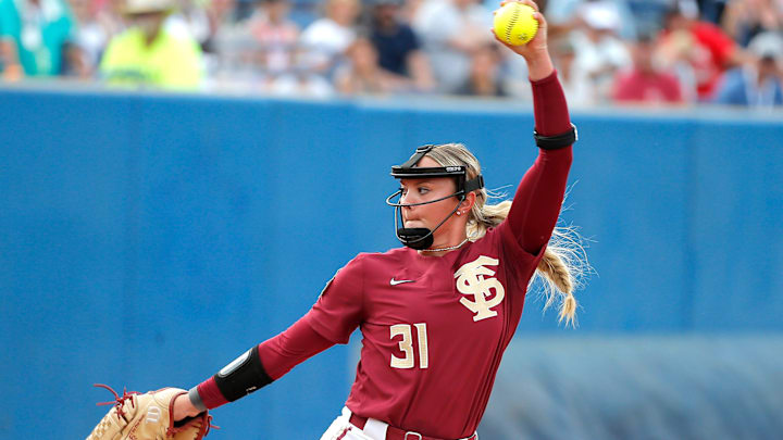Florida State's Makenna Reid (31) throws a pitch during a softball game between Washington and