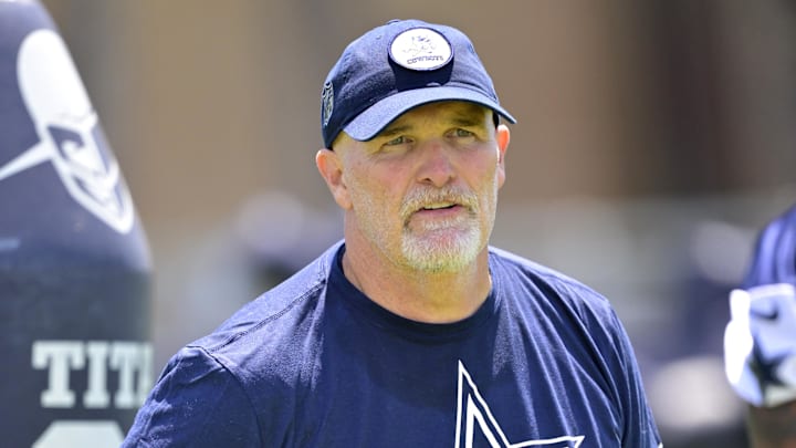 Jul 26, 2023; Oxnard, CA, USA; Dallas Cowboys offensive coordinator Dan Quinn watches over training
