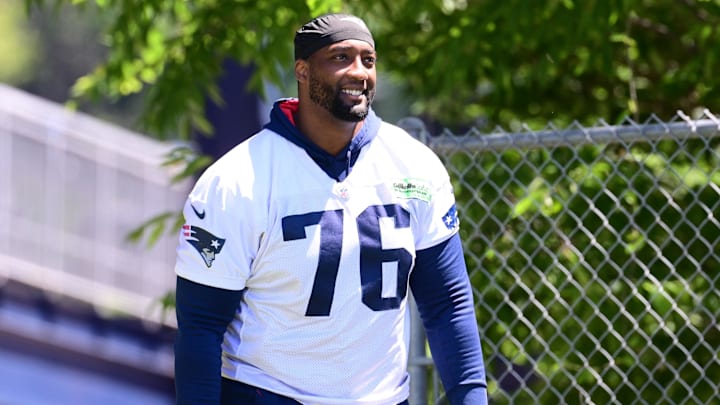 Jun 10, 2024; Foxborough, MA, USA; New England Patriots offensive tackle Calvin Anderson (76) walks to the practice fields for minicamp at Gillette Stadium. Mandatory Credit: Eric Canha-Imagn Images Jun 10, 2024; Foxborough, MA, USA; New England Patriots offensive tackle Calvin Anderson (76) walks to the practice fields for minicamp at Gillette Stadium. Mandatory Credit: Eric Canha-Imagn Images