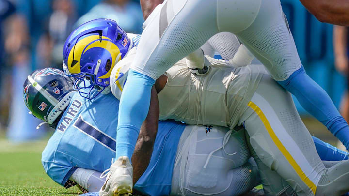 Los Angeles Rams linebacker Byron Young (0) sacks Tennessee Titans quarterback Cam Ward (1) during the first quarter at Nissan Stadium in Nashville, Tenn., Sunday, Sept. 14, 2025.