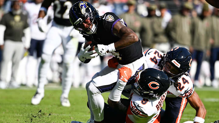 Ravens receiver Zay Flowers beats Jaquan Brisker and Nick McCloud for a catch in the first half Sunday in Baltimore. Ravens receiver Zay Flowers beats Jaquan Brisker and Nick McCloud for a catch in the first half Sunday in Baltimore.