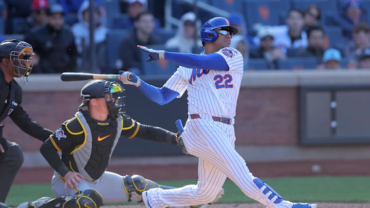 Mar 29, 2026; New York City, New York, USA; New York Mets left fielder Juan Soto (22) follows through on an RBI double against the Pittsburgh Pirates during the tenth inning at Citi Field. Mandatory Credit: Brad Penner-Imagn Images