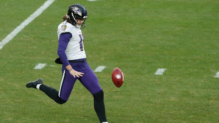 Dec 11, 2022; Pittsburgh, Pennsylvania, USA;  Baltimore Ravens punter Jordan Stout (11) punts the ball to the Pittsburgh Steelers during the third quarter at Acrisure Stadium. Mandatory Credit: Charles LeClaire-Imagn Images