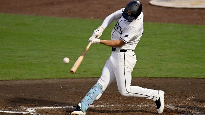 Tampa Bay Rays second baseman Brandon Lowe (8) hits a double in the fourth inning against the Baltimore Orioles at George M. Steinbrenner Field. Tampa Bay Rays second baseman Brandon Lowe (8) hits a double in the fourth inning against the Baltimore Orioles at George M. Steinbrenner Field.