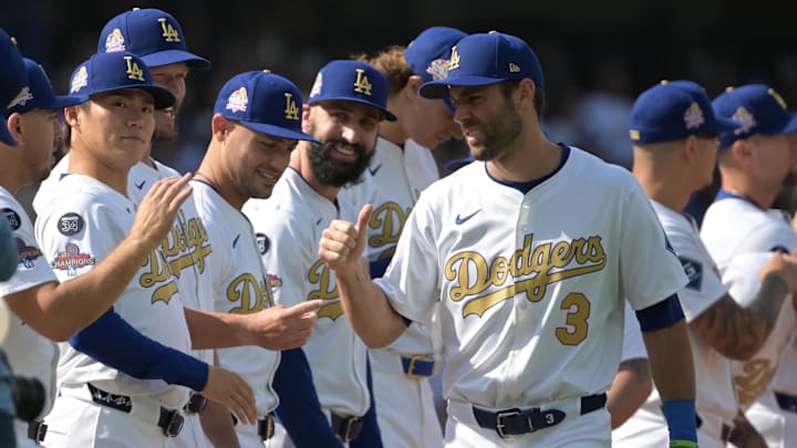 Mar 27, 2025; Los Angeles, California, USA; Los Angeles Dodgers outfielder Chris Taylor (3) reacts with teammates before the game against the Detroit Tigers at Dodger Stadium. Mandatory Credit: Jayne Kamin-Oncea-Imagn Images Mar 27, 2025; Los Angeles, California, USA; Los Angeles Dodgers outfielder Chris Taylor (3) reacts with teammates before the game against the Detroit Tigers at Dodger Stadium. Mandatory Credit: Jayne Kamin-Oncea-Imagn Images
