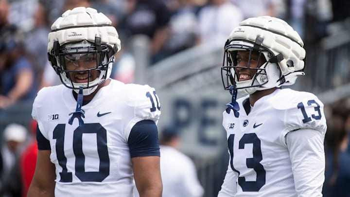 Penn State freshman running backs Nicholas Singleton and Kaytron Allen share a laugh together before a Nittany Lions game.
