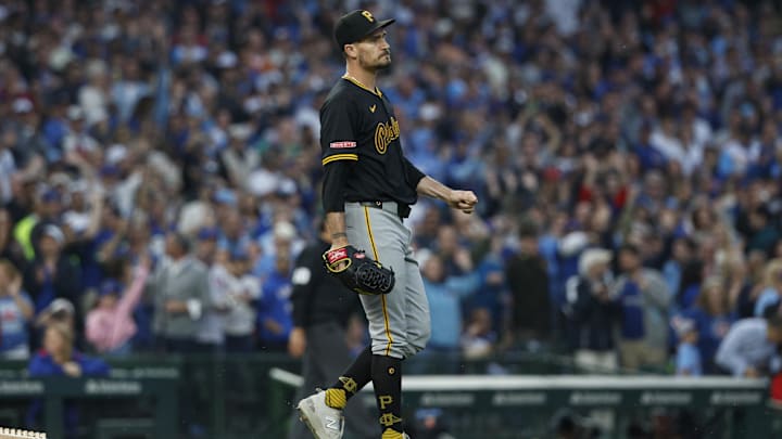 Jun 12, 2025; Chicago, Illinois, USA; Pittsburgh Pirates starting pitcher Andrew Heaney (45) reacts after giving up a two-run home run to Chicago Cubs center fielder Pete Crow-Armstrong during the fourth inning at Wrigley Field. Mandatory Credit: Kamil Krzaczynski-Imagn Images