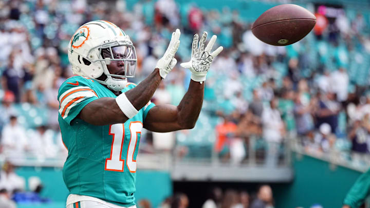 Dec 24, 2023; Miami Gardens, Florida, USA; Miami Dolphins wide receiver Tyreek Hill (10) warms up prior to the game against the Dallas Cowboys at Hard Rock Stadium. Mandatory Credit: Jasen Vinlove-USA TODAY Sports