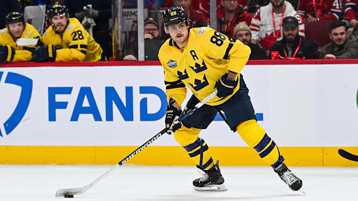 Feb 12, 2025; Montreal, Quebec, CAN; [Imagn Images direct customers only] Team Sweden forward William Nylander (88) plays the puck against Team Canada in overtime during a 4 Nations Face-Off ice hockey game at Bell Centre. Mandatory Credit: David Kirouac-Imagn Images