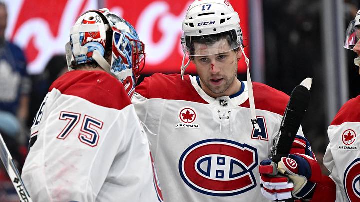 Montreal Canadiens forward Josh Anderson (17) greets goalie Jakub Dobes (75) as they celebrate a win over the Toronto Maple Leafs at Scotiabank Arena.  Mandatory Credit: Dan Hamilton-Imagn Images