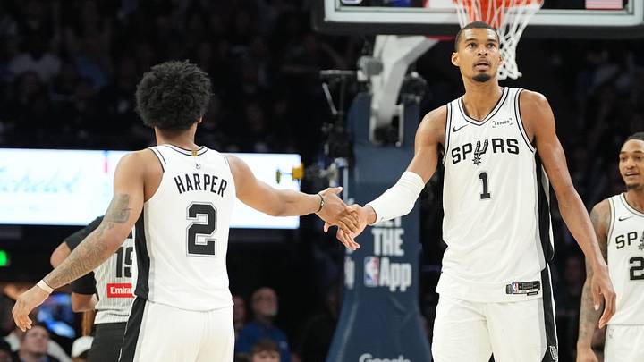 May 15, 2026; Minneapolis, Minnesota, USA; San Antonio Spurs forward Victor Wembanyama (1) shakes hands with San Antonio Spurs guard Dylan Harper (2) against the Minnesota Timberwolves in the second half during game six of the second round of the 2026 NBA Playoffs at Target Center. Mandatory Credit: Jesse Johnson-Imagn Images May 15, 2026; Minneapolis, Minnesota, USA; San Antonio Spurs forward Victor Wembanyama (1) shakes hands with San Antonio Spurs guard Dylan Harper (2) against the Minnesota Timberwolves in the second half during game six of the second round of the 2026 NBA Playoffs at Target Center. Mandatory Credit: Jesse Johnson-Imagn Images