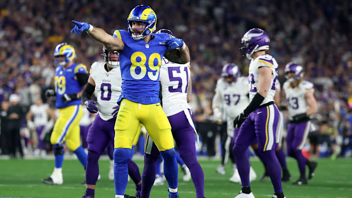 Jan 13, 2025; Glendale, AZ, USA; Los Angeles Rams tight end Tyler Higbee (89) reacts after a catch against the Minnesota Vikings during the first half in an NFC wild card game at State Farm Stadium. Mandatory Credit: Mark J. Rebilas-Imagn Images