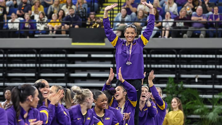 LSU’s Haleigh Bryant is awarded the all around award during the awards presentation after the Purple and Gold Podium Challenge woman s gymnastics LSU vs George Washington at the Raising Canes River Center.