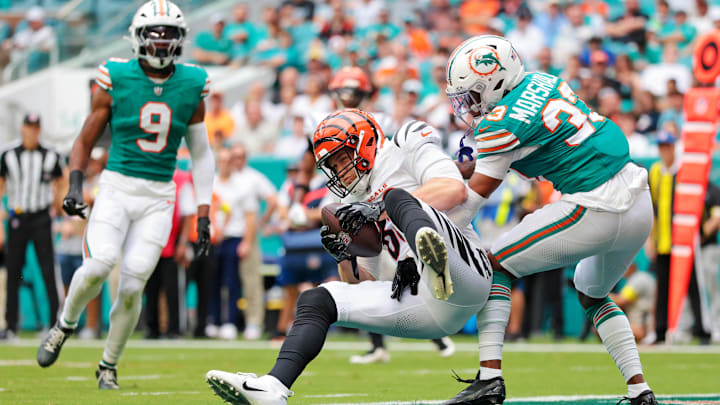 Cincinnati Bengals tight end Mike Gesicki (88) catches a touchdown over Miami Dolphins cornerback Jason Marshall Jr. (33) during the fourth quarter at Hard Rock Stadium.