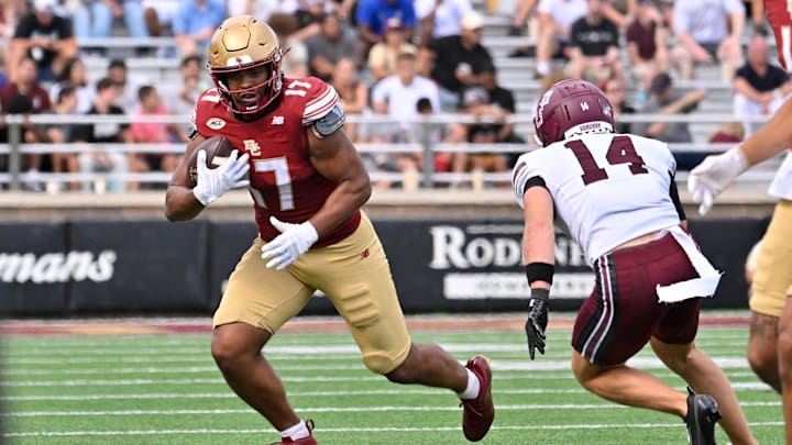 Aug 30, 2025; Chestnut Hill, Massachusetts, USA; Boston College Eagles tight end Jeremiah Franklin (17) runs the ball against Fordham Rams defensive back Alex Kemper (14) during the first half at Alumni Stadium. Mandatory Credit: Eric Canha-Imagn Images