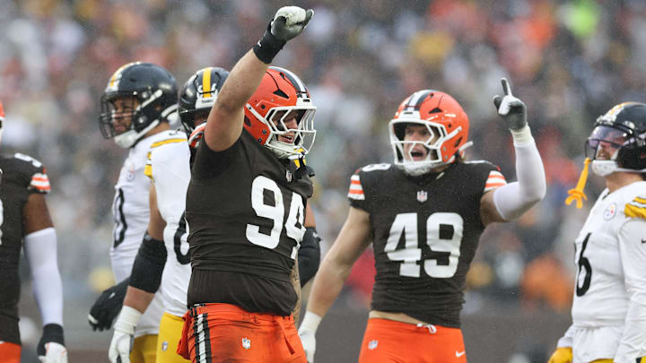 Dec 28, 2025; Cleveland, Ohio, USA; Cleveland Browns defensive tackle Mason Graham (94) and linebacker Carson Schwesinger (49) celebrate in the second quarter against the Pittsburgh Steelers at Huntington Bank Field. Mandatory Credit: Scott Galvin-Imagn Images