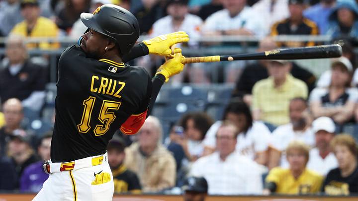 May 12, 2026; Pittsburgh, Pennsylvania, USA;  Pittsburgh Pirates center fielder Oneil Cruz (15) hits a double against the Colorado Rockies during the fifth inning at PNC Park. Mandatory Credit: Charles LeClaire-Imagn Images