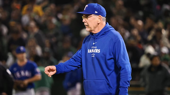 Sep 25, 2024; Oakland, California, USA; Texas Rangers manager Bruce Bochy (15) walks onto the field to replace the pitcher against the Oakland Athletics during the fourth inning at Oakland-Alameda County Coliseum. Sep 25, 2024; Oakland, California, USA; Texas Rangers manager Bruce Bochy (15) walks onto the field to replace the pitcher against the Oakland Athletics during the fourth inning at Oakland-Alameda County Coliseum.