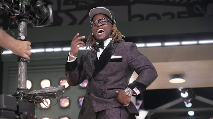 Boise State Broncos running back Ashton Jeanty poses after being selected by the Las Vegas Raiders as the number six pick in the first round of the 2025 NFL Draft at Lambeau Field.