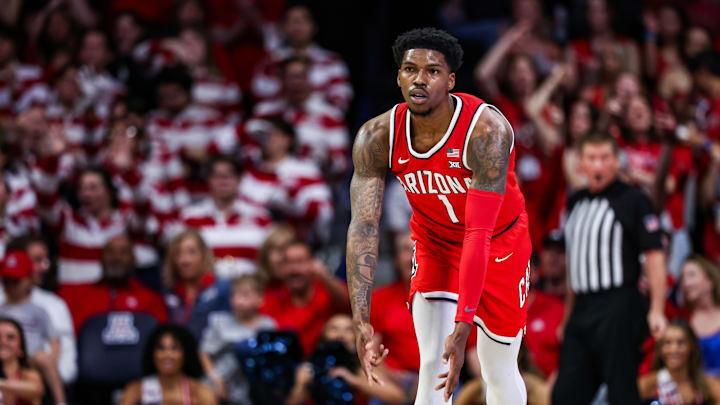 Feb 22, 2025; Tucson, Arizona, USA; Arizona Wildcats guard Caleb Love (1) holds out a three after he makes a three-point basket during the first half against the BYU Cougars at McKale Center. Mandatory Credit: Aryanna Frank-Imagn Images