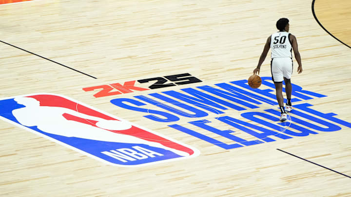 Jul 22, 2024; Las Vegas, NV, USA; Miami Heat guard Isaiah Stevens (50) dribbles the ball against the Memphis Grizzlies during the second half at Thomas & Mack Center. Mandatory Credit: Lucas Peltier-Imagn Images