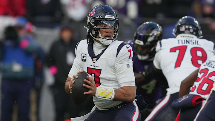 Jan 20, 2024; Baltimore, MD, USA; Houston Texans quarterback C.J. Stroud (7) drops back to pass against the Baltimore Ravens in the first half of a 2024 AFC divisional round game at M&T Bank Stadium. Mandatory Credit: Mitch Stringer-USA TODAY Sports