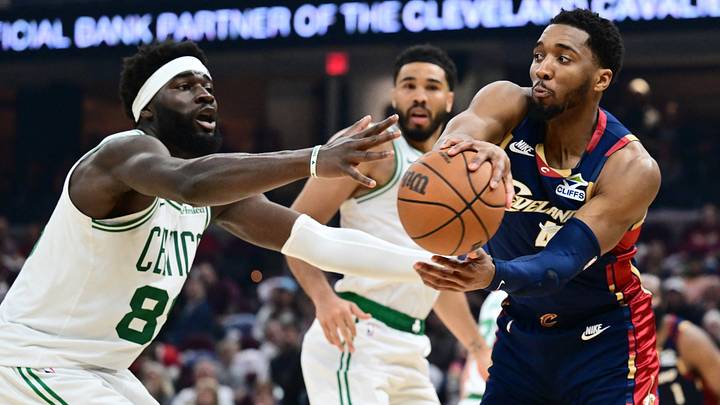 Mar 8, 2026; Cleveland, Ohio, USA; Cleveland Cavaliers guard Donovan Mitchell (45) passes as Boston Celtics center Neemias Queta (88) defends during the second half at Rocket Arena. Mandatory Credit: Ken Blaze-Imagn Images Mar 8, 2026; Cleveland, Ohio, USA; Cleveland Cavaliers guard Donovan Mitchell (45) passes as Boston Celtics center Neemias Queta (88) defends during the second half at Rocket Arena. Mandatory Credit: Ken Blaze-Imagn Images