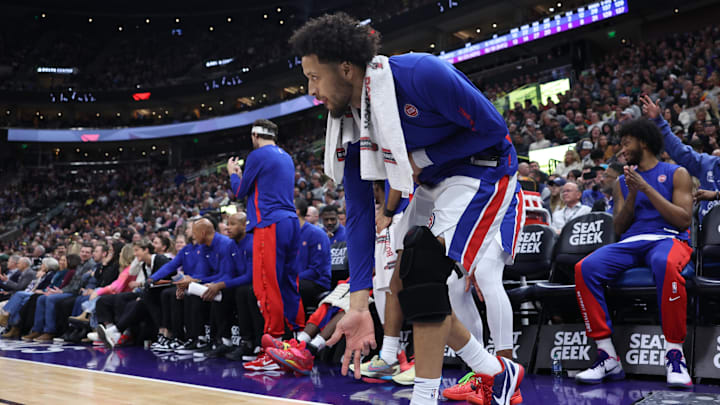 Jan 3, 2024; Salt Lake City, Utah, USA; Detroit Pistons guard Cade Cunningham (2) reacts to a shot against the Utah Jazz during the fourth quarter at Delta Center. Mandatory Credit: Rob Gray-Imagn Images