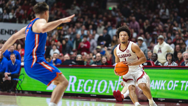 Mar 5, 2025; Tuscaloosa, Alabama, USA; Alabama Crimson Tide guard Mark Sears (1) goes to shoot against Florida Gators guard Urban Klavzar (7) during the second half at Coleman Coliseum. Mandatory Credit: Will McLelland-Imagn Images
