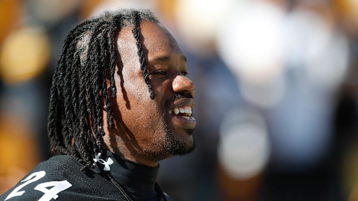 Nov 12, 2023; Pittsburgh, Pennsylvania, USA;  Pittsburgh Steelers former linebacker Joey Porter Sr. watches warm ups before the game against the Green Bay Packers at Acrisure Stadium. Mandatory Credit: Charles LeClaire-Imagn Images