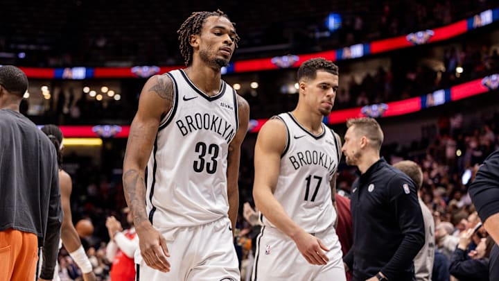 Jan 14, 2026; New Orleans, Louisiana, USA;  Brooklyn Nets forward Michael Porter Jr. (17) and center Nic Claxton (33) head to the locker room after the game against the New Orleans Pelicans at Smoothie King Center. Mandatory Credit: Stephen Lew-Imagn Images