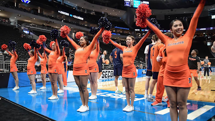 Mar 20, 2025; Milwaukee, WI, USA; Illinois Fighting Illini cheerleaders perform during NCAA Tournament First Round Practice at Fiserv Forum. Mandatory Credit: Benny Sieu-Imagn Images Mar 20, 2025; Milwaukee, WI, USA; Illinois Fighting Illini cheerleaders perform during NCAA Tournament First Round Practice at Fiserv Forum. Mandatory Credit: Benny Sieu-Imagn Images