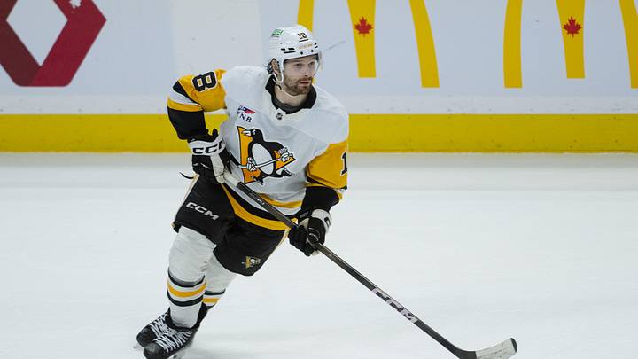 Mar 26, 2026; Ottawa, Ontario, CAN; Pittsburgh Penguins center Thomas Novak (18) skates with the puck in overtime against the Ottawa Senators at the Canadian Tire Centre. Mandatory Credit: Marc DesRosiers-IMAGN Images