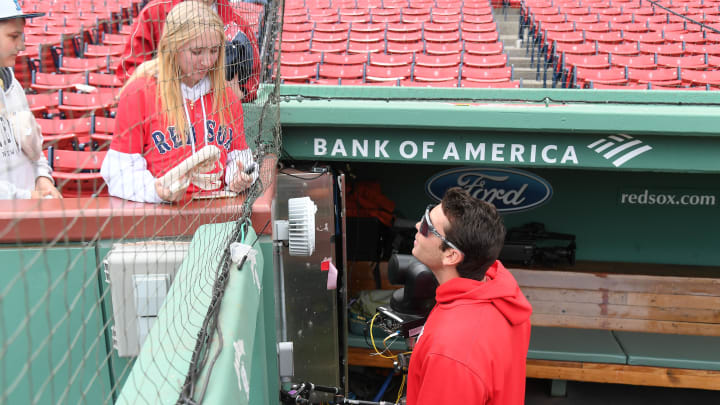 May 12, 2024; Boston, Massachusetts, USA;  Boston Red Sox first baseman Triston Casas speaks to a fan before a game against the Washington Nationals at Fenway Park.