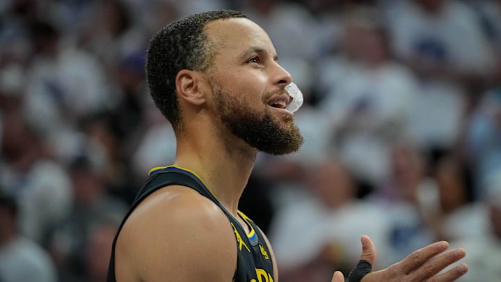 Golden State Warriors guard Stephen Curry (30) prepares to play the Minnesota Timberwolves before game one of the second round for the 2025 NBA Playoffs at Target Center. Mandatory Credit: Bruce Kluckhohn-Imagn Images