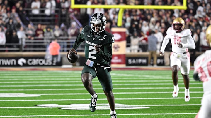 Sep 21, 2024; Chestnut Hill, Massachusetts, USA; Michigan State Spartans quarterback Aidan Chiles (2) runs the ball against the Boston College Eagles during the first half at Alumni Stadium. Mandatory Credit: Eric Canha-Imagn Images