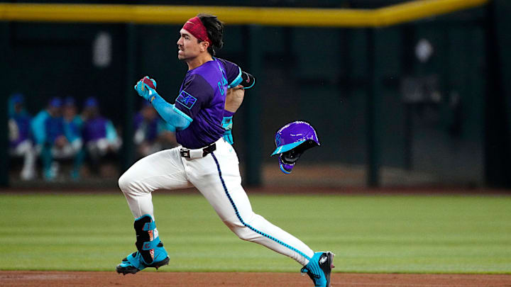 Diamondbacks outfielder Corbin Carroll (7) rounds second on the way to a triple against the Dodgers during a game at Chase Field on May 10, 2025, in Phoenix. Diamondbacks outfielder Corbin Carroll (7) rounds second on the way to a triple against the Dodgers during a game at Chase Field on May 10, 2025, in Phoenix.