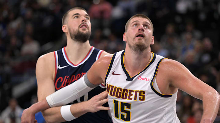 Apr 26, 2025; Inglewood, California, USA; Denver Nuggets center Nikola Jokic (15) and Los Angeles Clippers center Ivica Zubac (40) looks for a rebound in the second half of game four of round one of the 2024 NBA Playoffs at Intuit Dome. Mandatory Credit: Jayne Kamin-Oncea-Imagn Images Apr 26, 2025; Inglewood, California, USA; Denver Nuggets center Nikola Jokic (15) and Los Angeles Clippers center Ivica Zubac (40) looks for a rebound in the second half of game four of round one of the 2024 NBA Playoffs at Intuit Dome. Mandatory Credit: Jayne Kamin-Oncea-Imagn Images