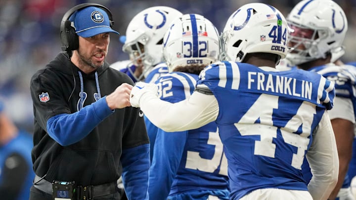 Indianapolis Colts Head Coach Shane Steichen fist bumps Indianapolis Colts linebacker Zaire Franklin (44) on Sunday, Jan. 5, 2025, during a game against the Jacksonville Jaguars at Lucas Oil Stadium in Indianapolis.