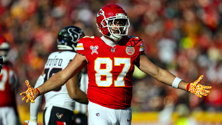 Dec 21, 2024; Kansas City, Missouri, USA; Kansas City Chiefs tight end Travis Kelce (87) reacts after a first down during the first half against the Houston Texans at GEHA Field at Arrowhead Stadium. Mandatory Credit: Jay Biggerstaff-Imagn Images