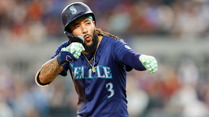 Seattle Mariners shortstop J.P. Crawford celebrates after hitting a triple against the Texas Rangers on Sept. 21 at Globe Life Field.