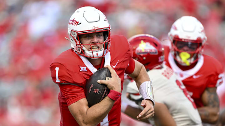 Oct 18, 2025; Houston, Texas, USA; Houston Cougars quarterback Conner Weigman (1) runs the ball into the end zone for a touchdown during the second quarter against the Arizona Wildcats at TDECU Stadium. Mandatory Credit: Maria Lysaker-Imagn Images 